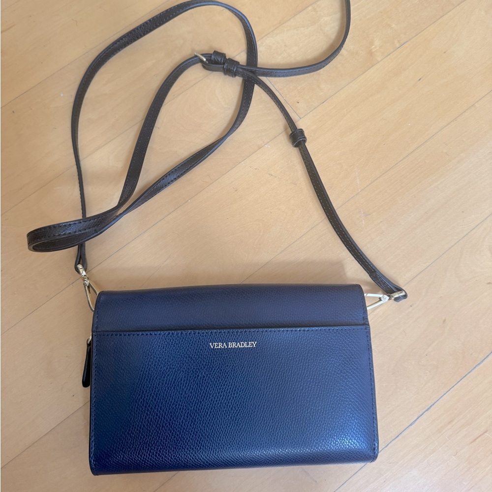 Vera Bradley leather crossbody never used but tags were removed.